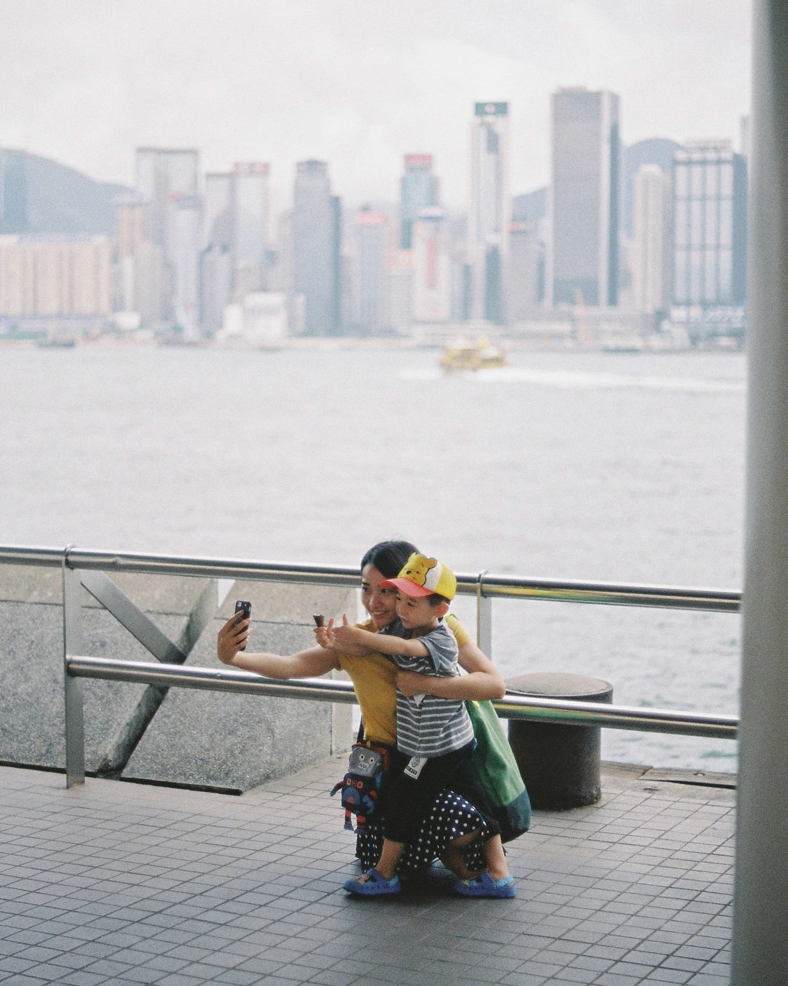 Hong Kong. Star Ferry. Woman and boy. Hong Kong. Star Ferry. Woman and boy.