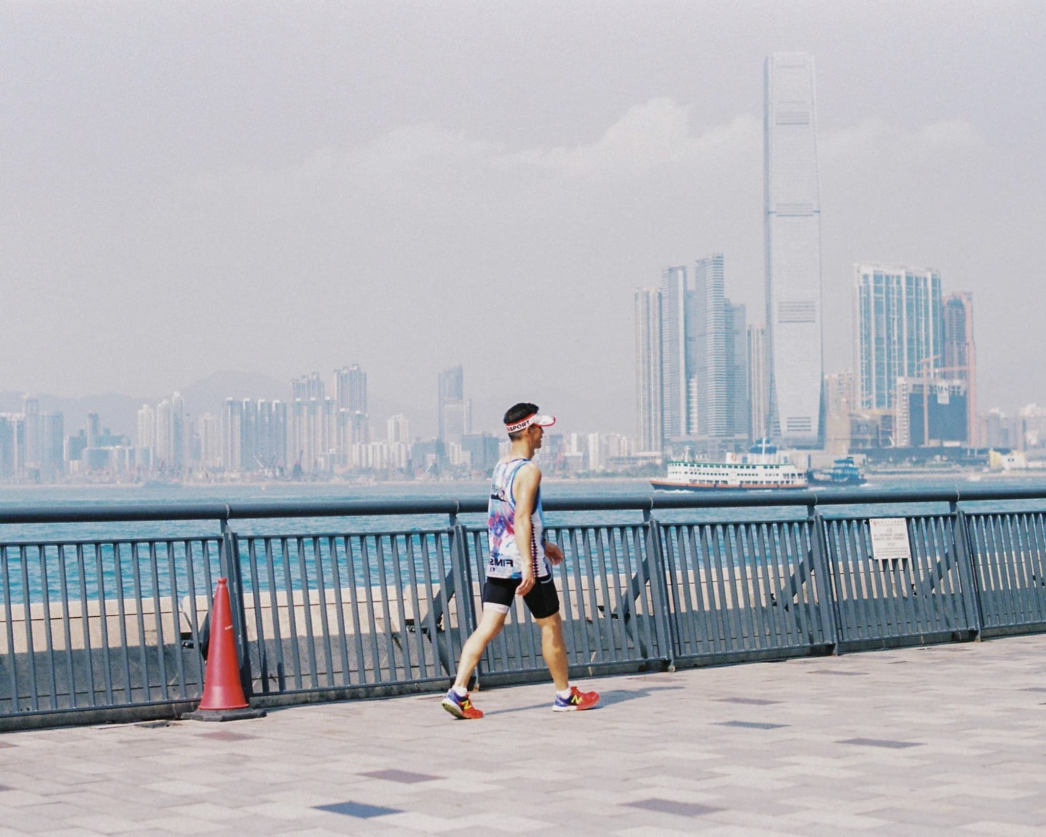 Hong Kong. Sai Ying Pun. Jogger. Hong Kong. Sai Ying Pun. Jogger.
